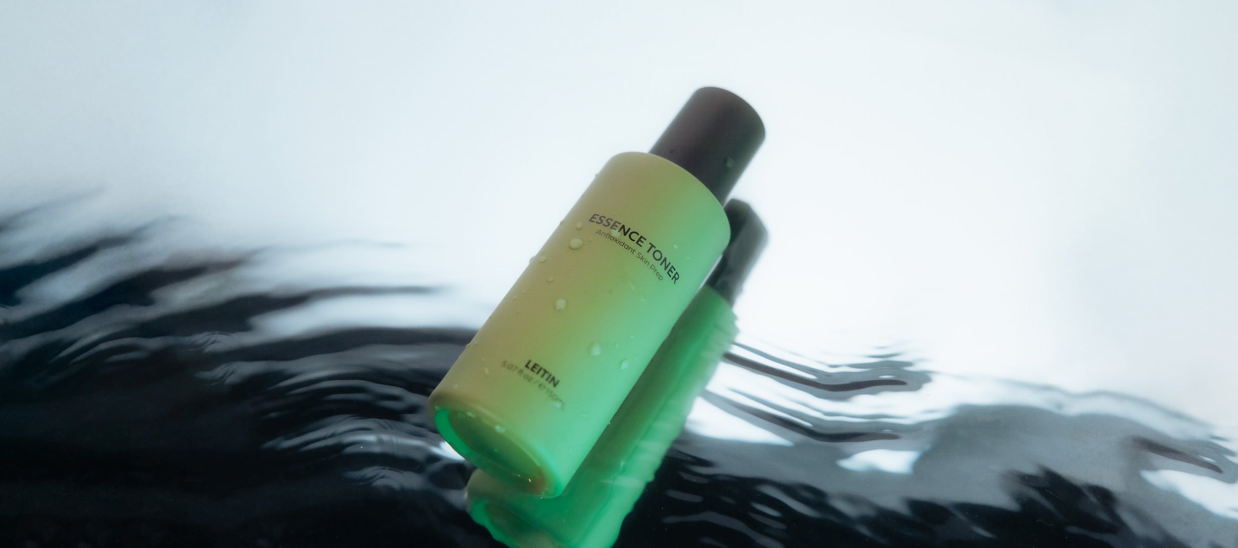 Editorial Image of LEITIN Skincare's Essence Toner in shimmery water