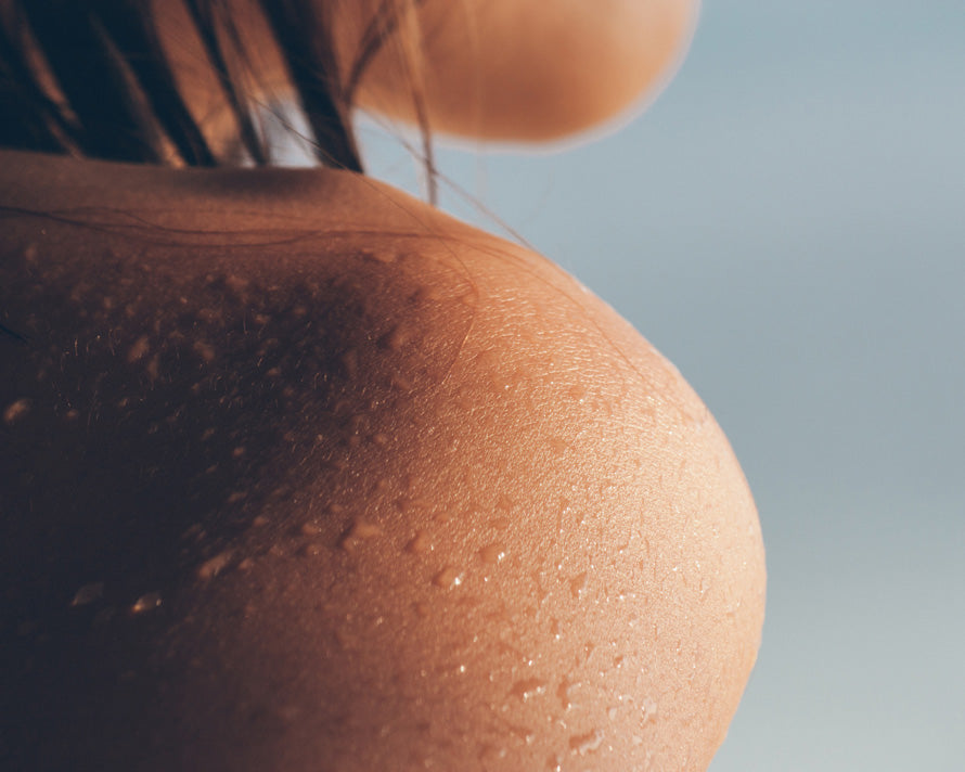 Image of a woman's wet shoulder